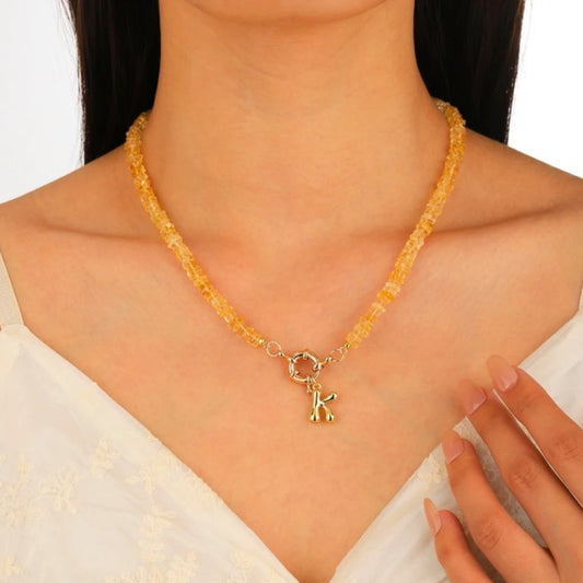 Pale Citrine Initial Necklace worn by model