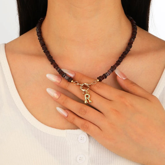 Garnet Initial Necklace worn by model