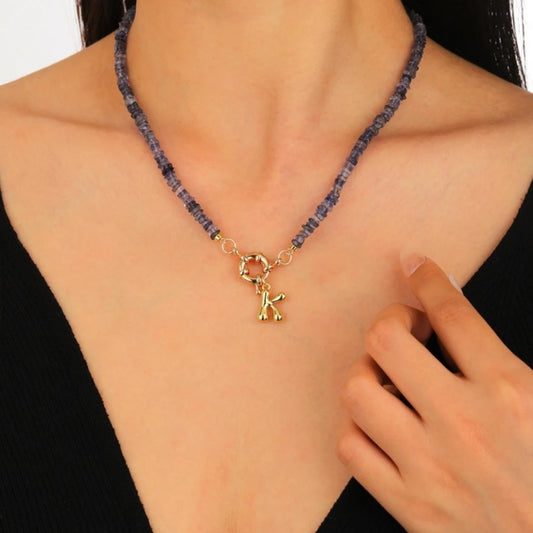 Iolite Initial Necklace worn by model